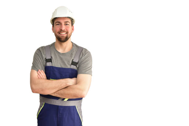 istock cheerful construction worker - craftsman in work clothes on white background - insulated 1188476723
