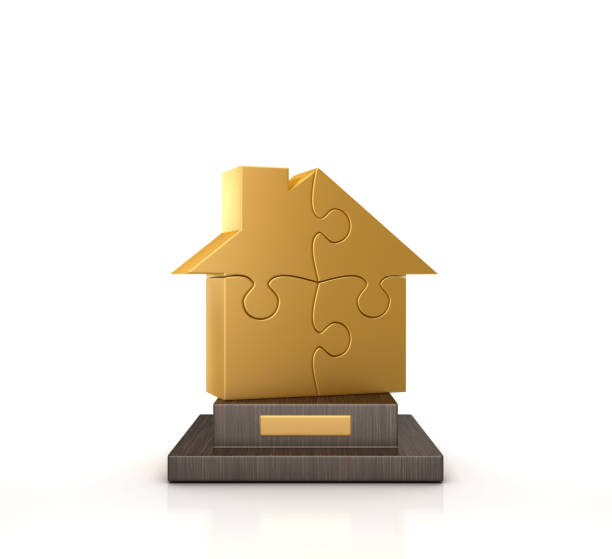trofeo con puzzle house - renderizado 3d - jigsaw piece puzzle jigsaw puzzle metal fotografías e imágenes de stock
