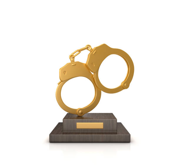 수갑이 달린 트로피 - 3d 렌더링 - golden handcuffs 뉴스 사진 이미지