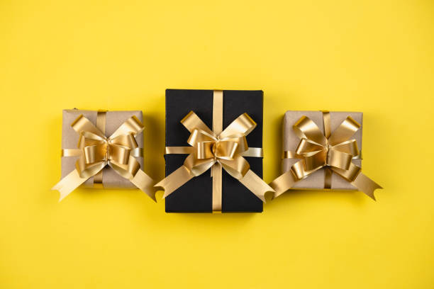istock Holiday composition. Various gift boxes on pastel yellow background. Christmas, new year, birthday concept. Minimal style, Flat lay, top view, copy space 1188479051
