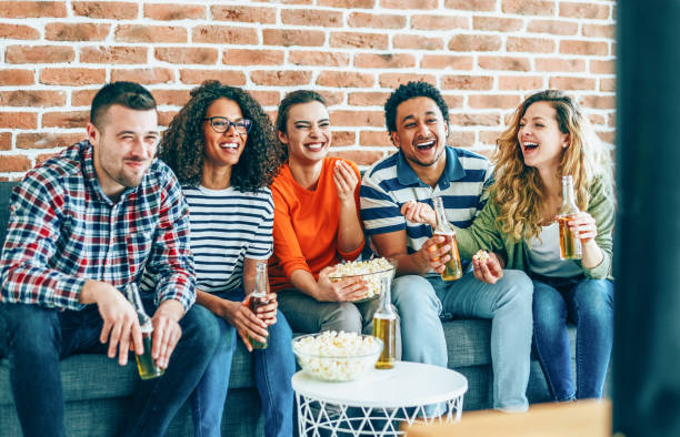 istock Group of friends watching tv 1188479313