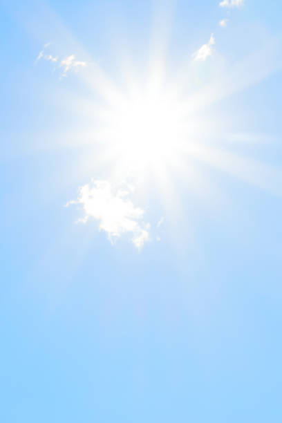 istock Bright sun with beautiful beams in the sky with clouds 1188480312