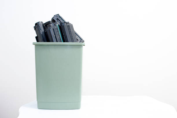 istock Spent cartridges are stacked in a container on a white background. 1188482255