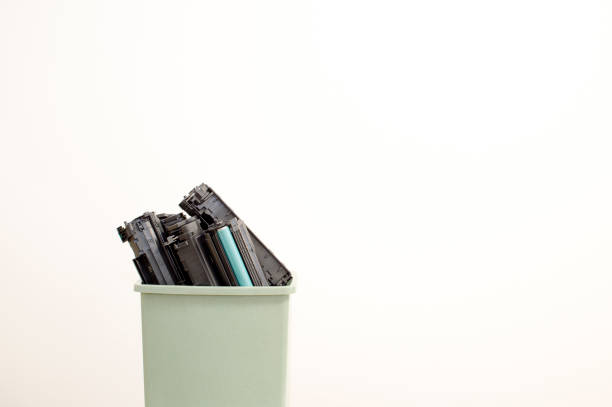 istock Spent cartridges close-up stacked in a container on a white background. 1188482263