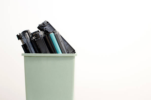istock Spent cartridges are stacked in a container on a white background. 1188482276