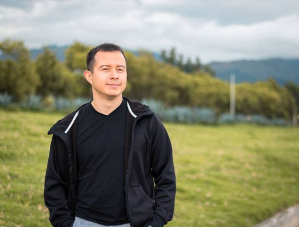 istock Smiling young man taking a walk outdoors 1188484471