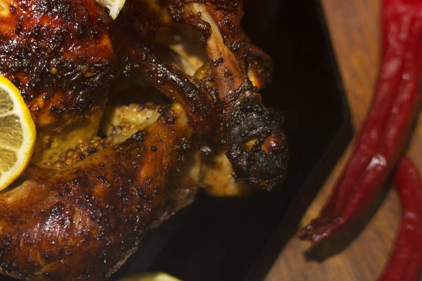 istock Chicken with lemon and red pepper. Thanksgiving Day 1188485760
