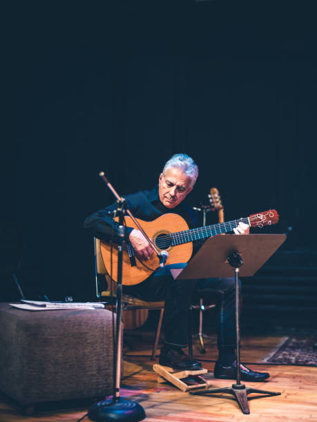 istock Male guitarist performing on the stage 1188485916