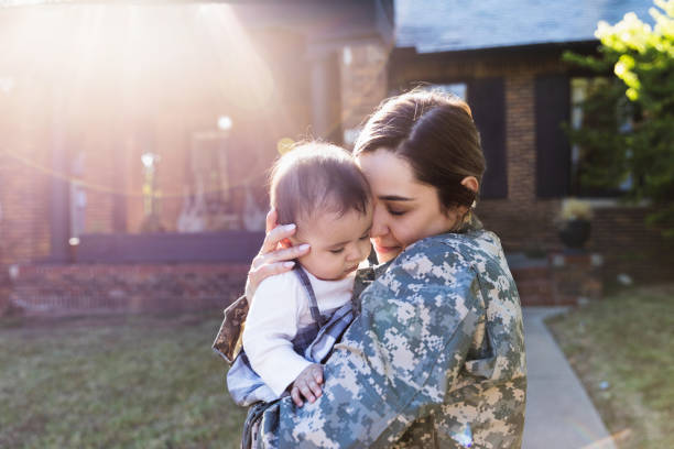 istock Affectionate mother embraces her baby 1188487432