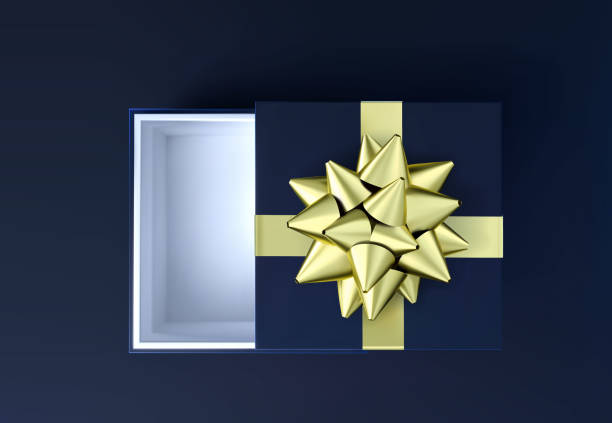 istock Black gift box with golden bow top view mock up. Luxury box packaging collection on black background. Opened box Christmas template. 3d realistic surprise present empty box with place for your logo. 1188487934