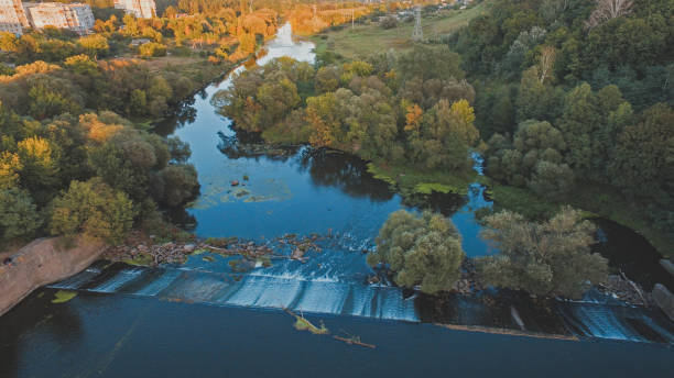 istock Evening river dam at the forest, Ukraine 1188490766