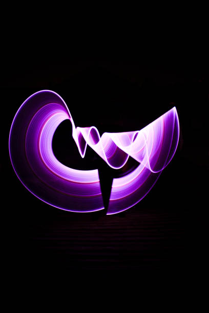 istock Curved abstract shape made with a light saber violet. 1188491235