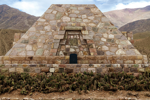 Stone pyramid at the archaeological site Pucara de Tilcara in Jujuy, Argentina photo