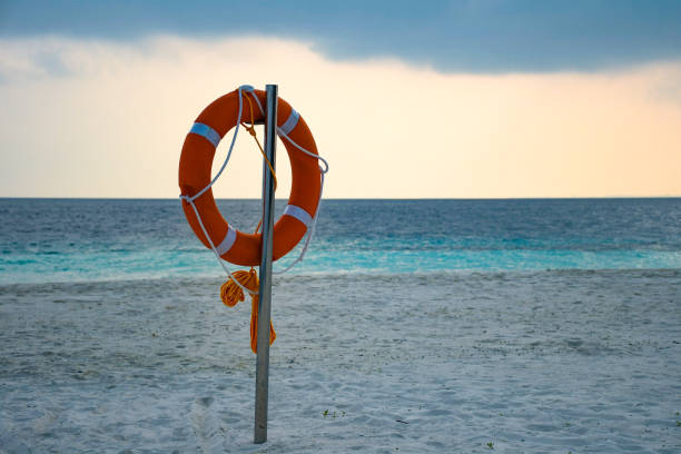 istock Yellow swimming rescue ring mounted on the pole 1188493079