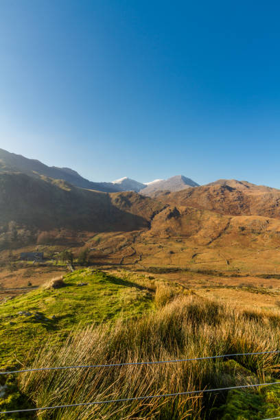 istock Beautiful mountains in Autumn Fall, snow on peak. 1188497950
