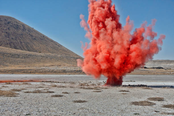 istock Colorful red smoke bombs action in showing 1188505201