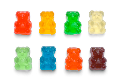 Several Colorful Gummy Bears Isolated on White Background.