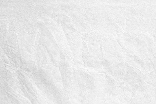 istock Old crumpled grey paper background texture 1188510669
