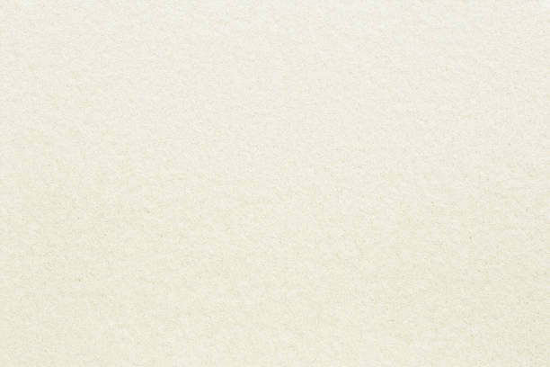istock pale old yellow paper background texture 1188510675