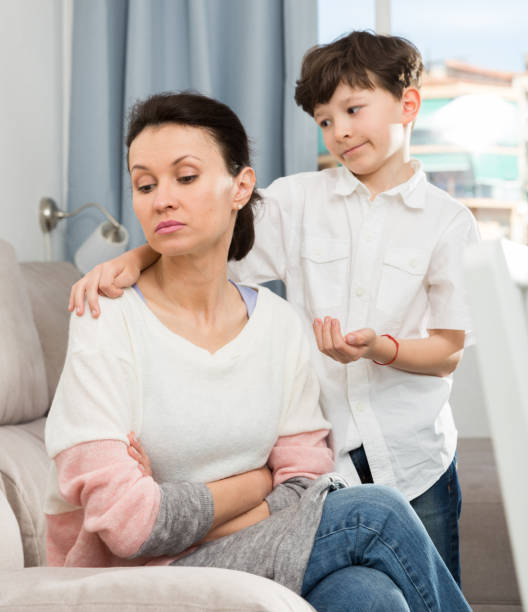 istock Son trying to apologize to mother 1188514632