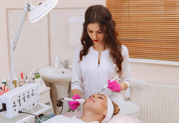istock Ultrasound cavitation procedure. Anti-aging, lifting procedure. 1188514678