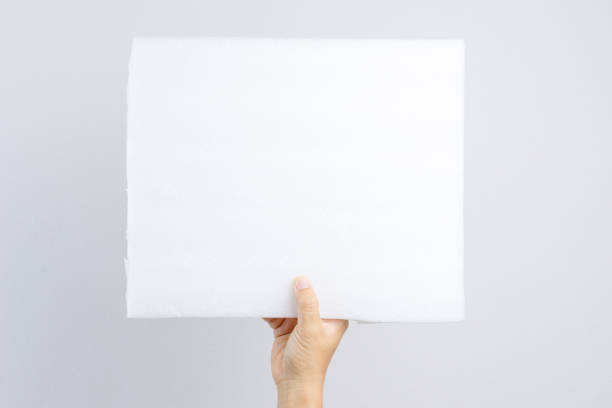 istock Hand holding foam fiber board 1188516296