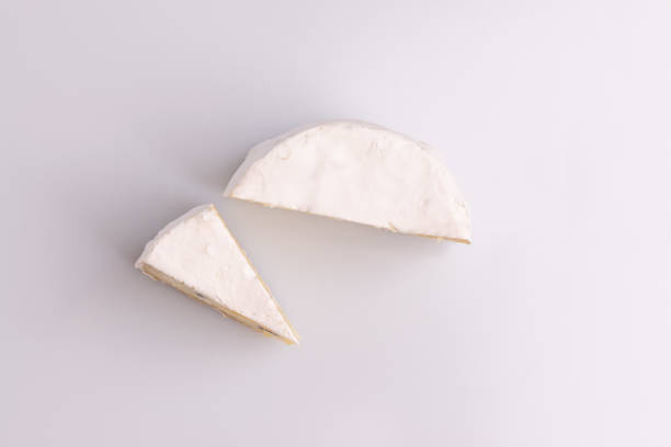 istock Blue cheese with white surface, isolated on white background, soft light, studio photo. Mix of gorgonzola and camembert / brie cheese. 1188516306