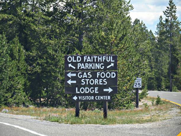 istock Close up directional signs at an intersection to different destinations around Yellowstone National Park, Wyoming. 1188520557