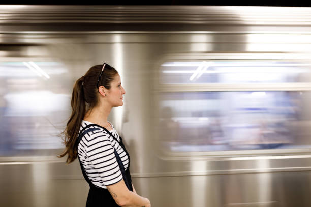 istock Woman waiting for the subway 1188520656