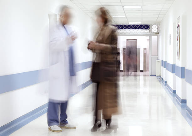 istock doctor and patient in hospital 118852207