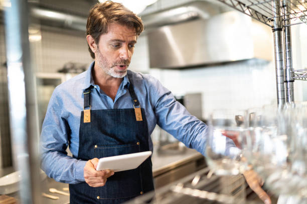 istock Business owner checking kitchen supplies 1188523398