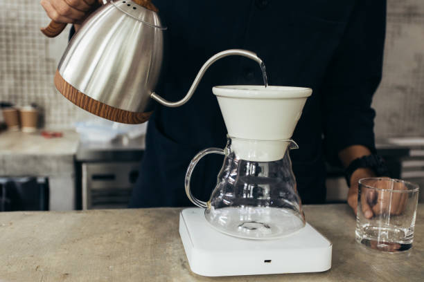 istock Barista brewing coffee, method pour over, drip coffee 1188524505