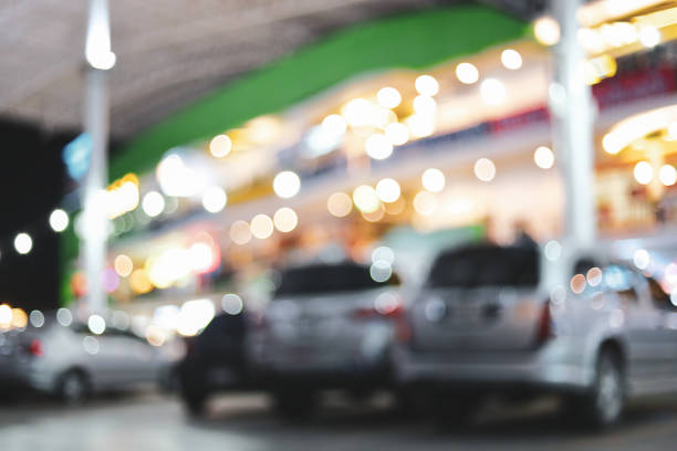 istock blur night light in business building with car park 1188527467