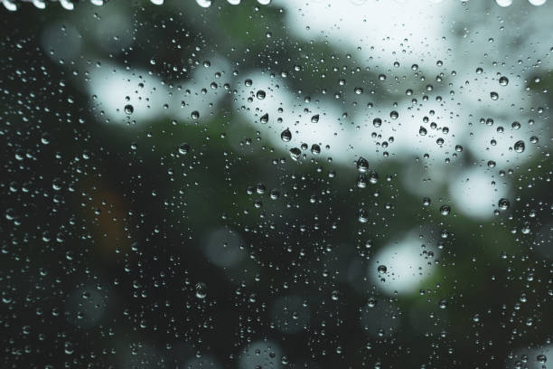 istock water rain drop on glass window 1188527595