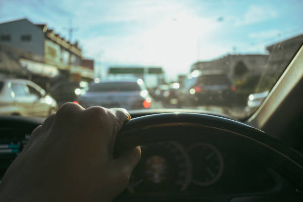 istock drive car, traffic jam in the city 1188527628