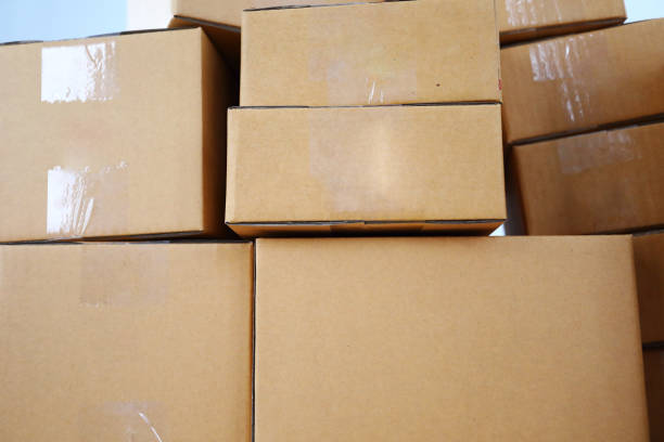 istock brown box post package many size preparing express delivery for consumer order in home office of freelance work online 1188527646