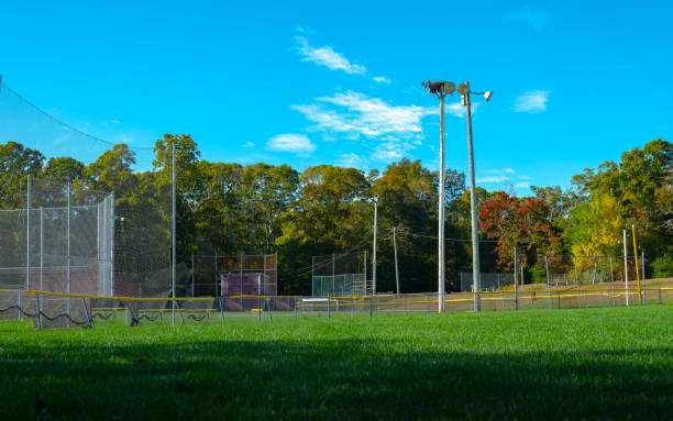 istock Baseball field with osprey nest on top of tall pole 1188528726