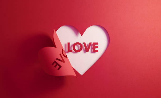 istock Love Concept- Love Text Inside Of A Red Folding Heart Shape On White Background 1188528932