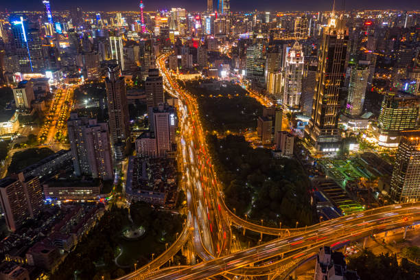 istock Urban highway traffic shanghai at night 1188531148