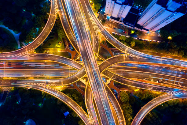 istock Urban highway traffic shanghai at night 1188531158