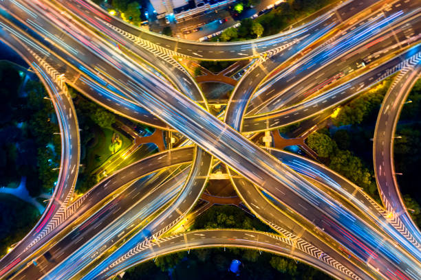 istock Urban highway traffic shanghai at night 1188531179