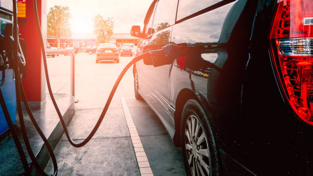 Car refueling at gas station stock photo