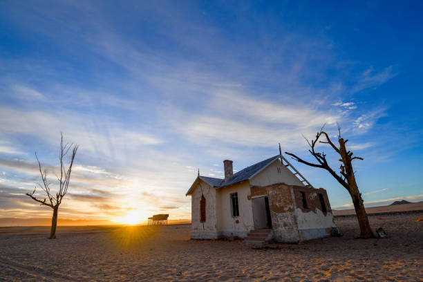 istock Sun rays over deserted Namibian train station 1188535551