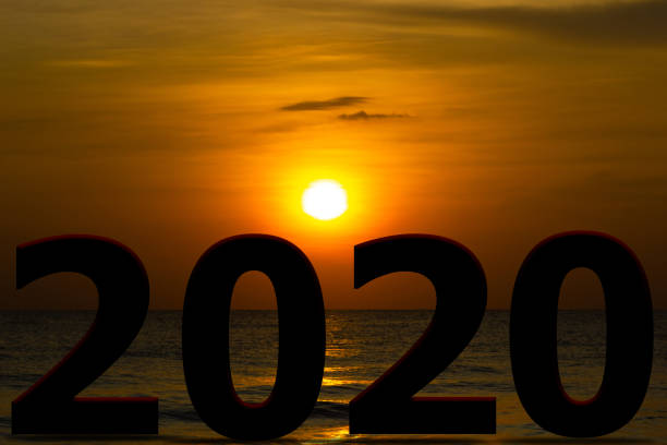 istock happy new year 2020 silhouette sunrise or sunset on background copy space 1188536657