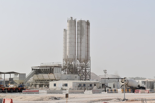 Cement manufacturing plant. Very difficult working environment for workers due to dust and pollution.