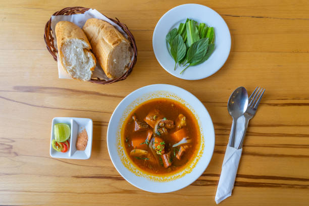 istock Delicious Vietnamese braised beef and bread baguette in restaurant 1188541302