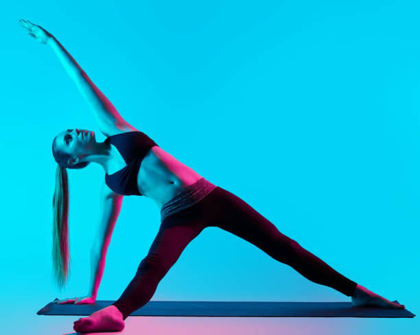 istock woman yoga exercises 1188542095
