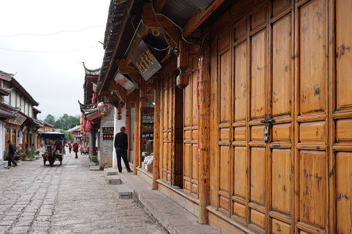 Quiet street of Shuhe Old Town during early morning time. It is a well-preserved Naxi ancient town, listed as UNESCO World Heritage site in 1997.