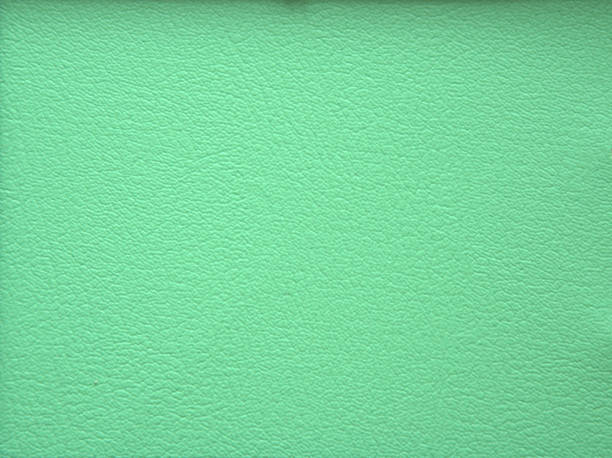 istock Coarse genuine leather, artificially painted in olive color. 1188553009