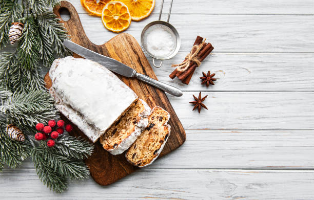 istock Christmas stollen on wooden background 1188554197